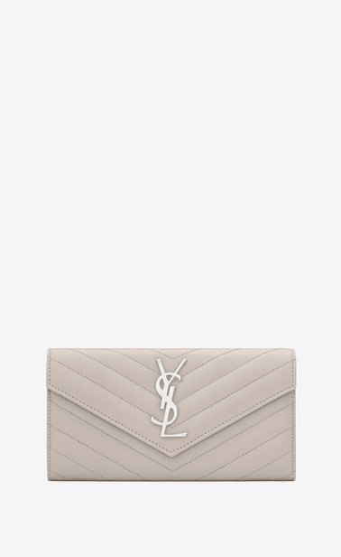 Monogram large flap wallet in grain de poudre embossed leather